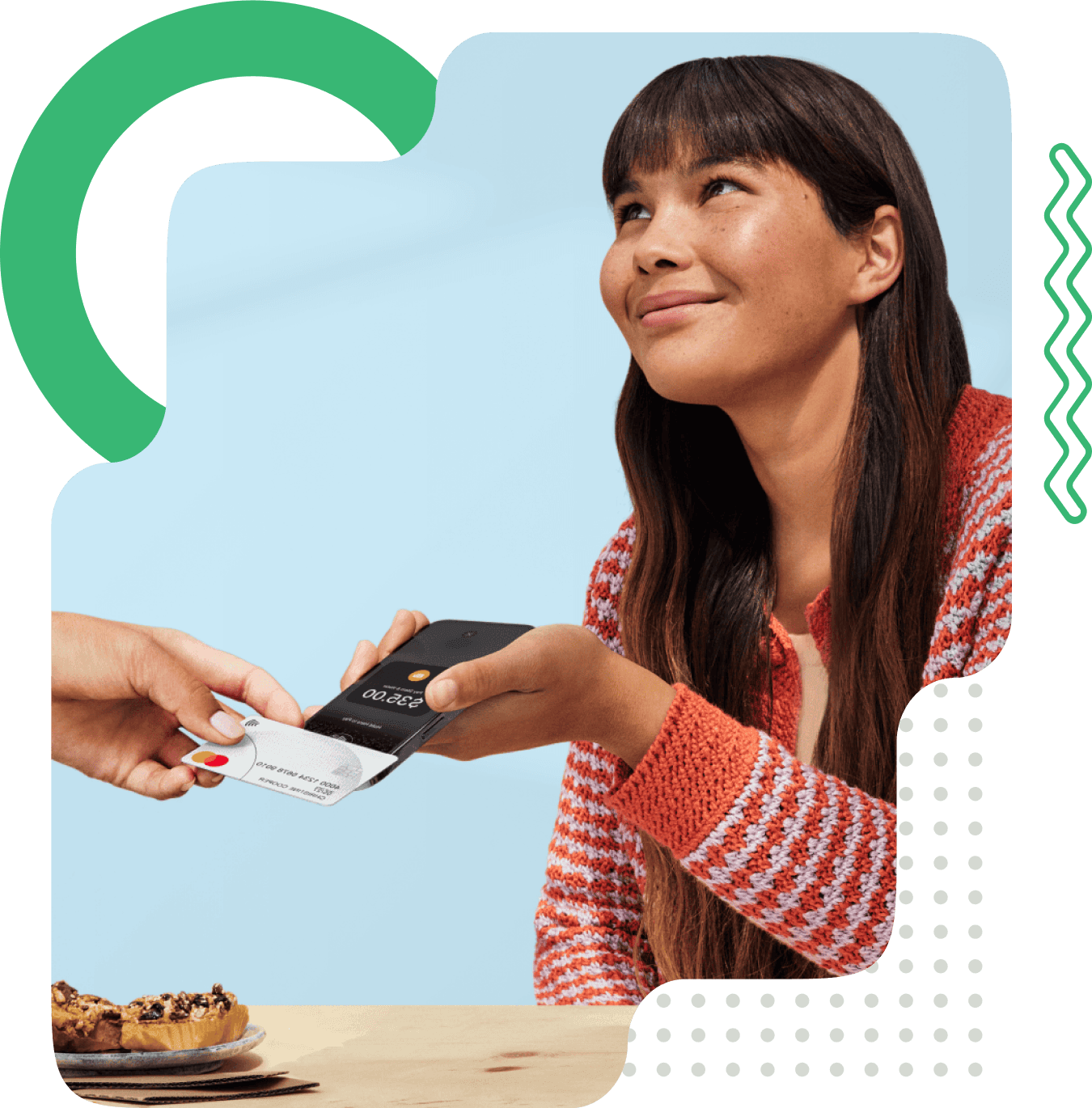A donor making a contactless donation by tapping a card against a phone running iDonate Tap